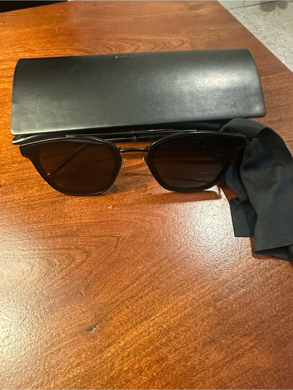 Saint Laurent Black Frame Sunglasses with Brown Lenses